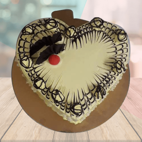 Order Online Heart Shape Butterscotch Cake near Noida Extension
