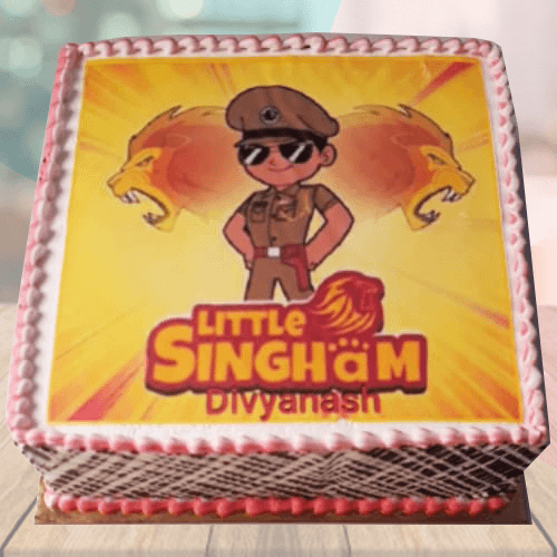Lil' Delights - Little Singham theme cake for Little Eniya ! Cake Flavor:  Eggless Lemon cake with Lemon Cream Cheese filling and Black Currant  Compote frosted in colored White Chocolate Ganache with