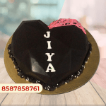 Heart shape pinata cake with hammer