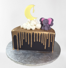 Baby elephant half birthday cake