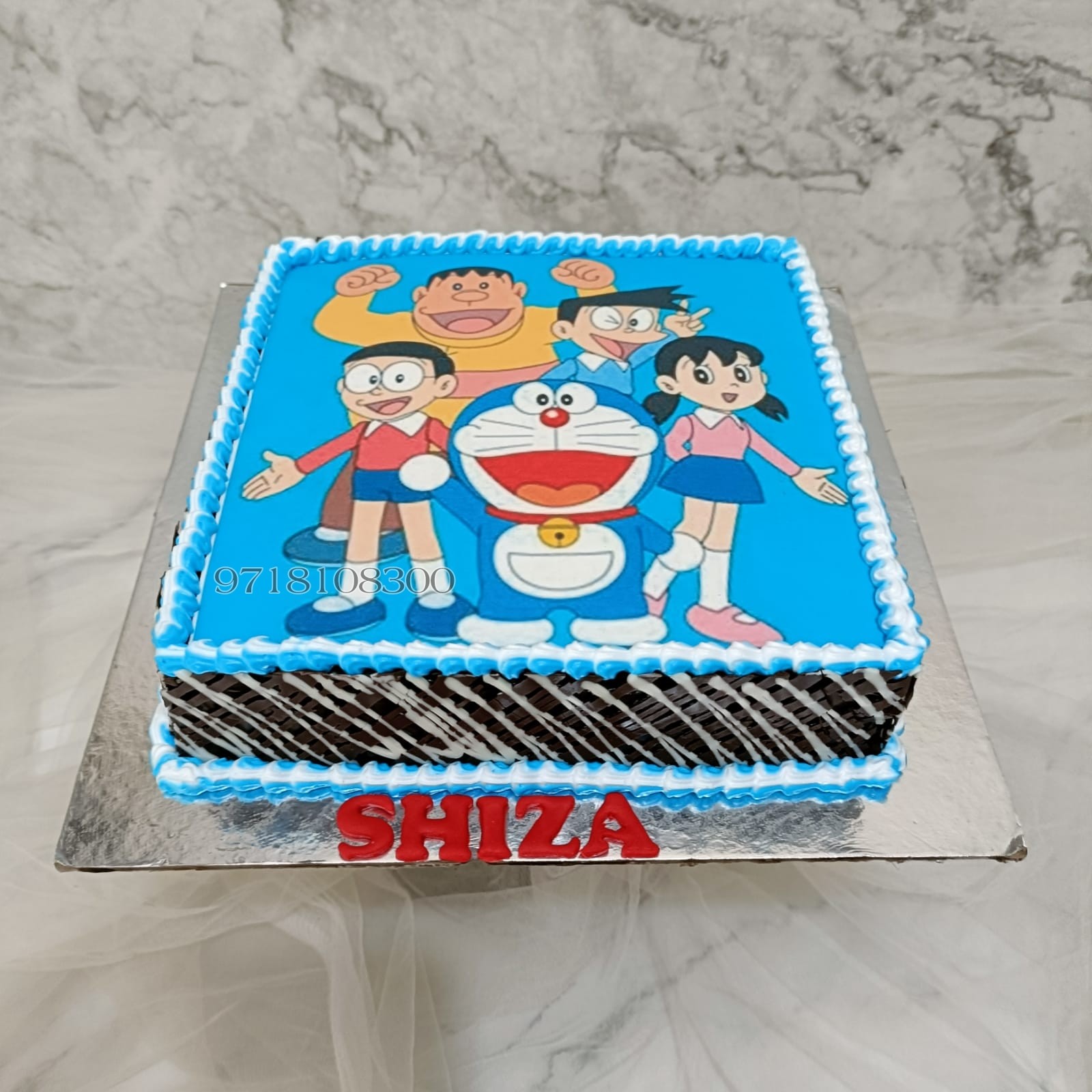 Doremon Gift Cake. Birthday Cakes for Kids. Noida & Gurgaon – Creme Castle